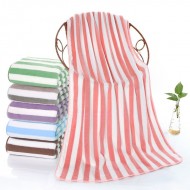 Manufacturer's wholesale warp-knitted high-density coral fleece towels, thickened face towels with logos, for foreign trade.
