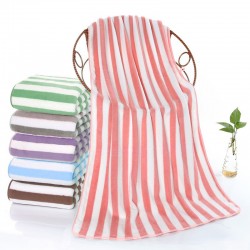 Manufacturer's wholesale warp-knitted high-density coral fleece towels, thickened face towels with logos, for foreign trade.